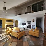 De La